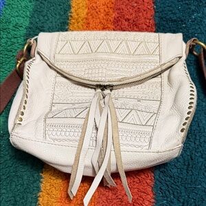 The Sak Cream Crossbody Bag with Tassel Detail